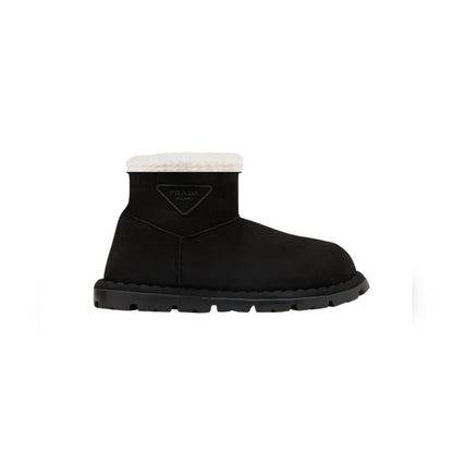 PD SHEARLING BOOTIES BLACK WITH RUBBER TRIANGLE LOGO